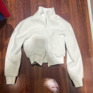 White fuzzy zip up
